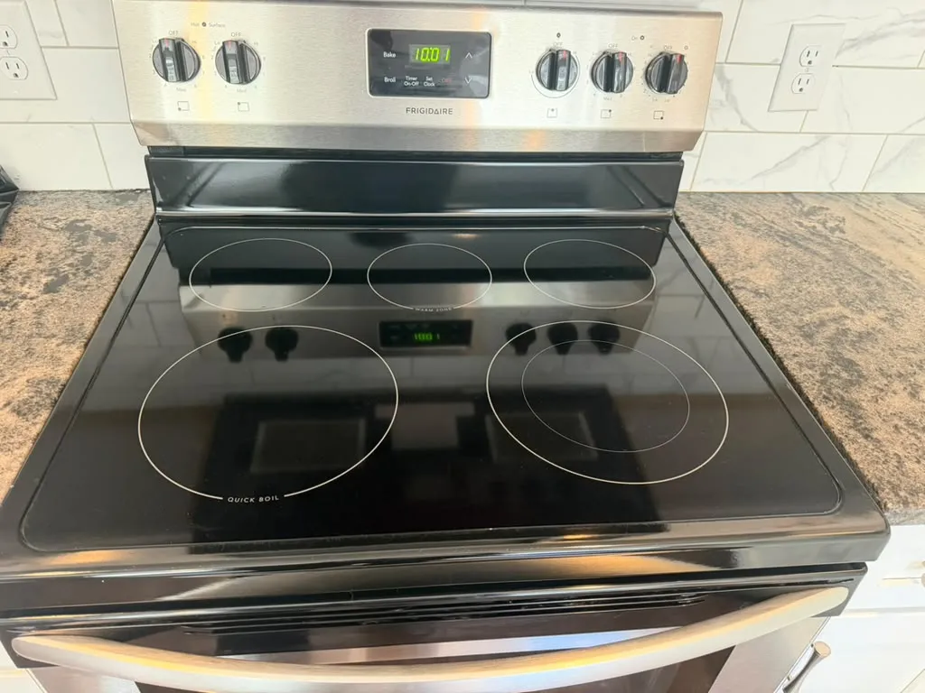 Stovetop polished after a kitchen deep clean